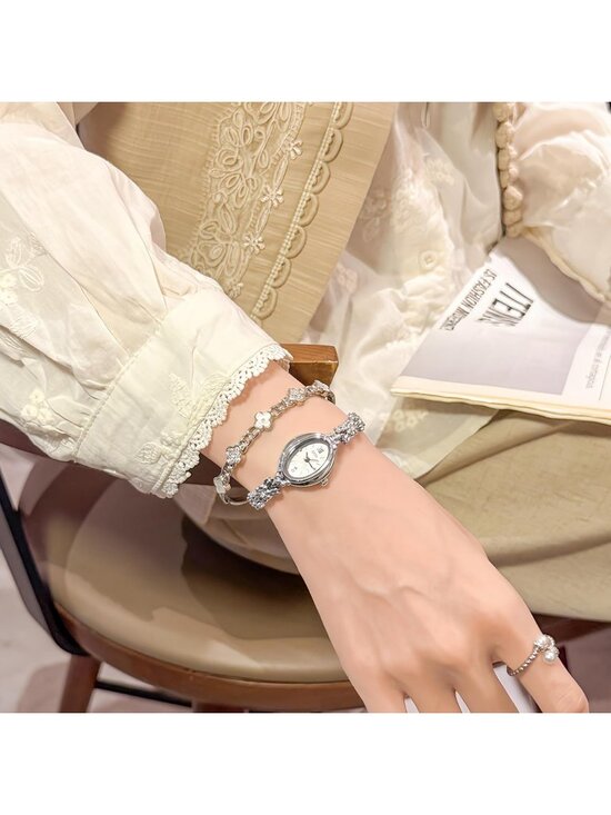 Women\'s White Silver Analog Quartz Alloy Steel Oval Roman Numeral Bracelet Watch